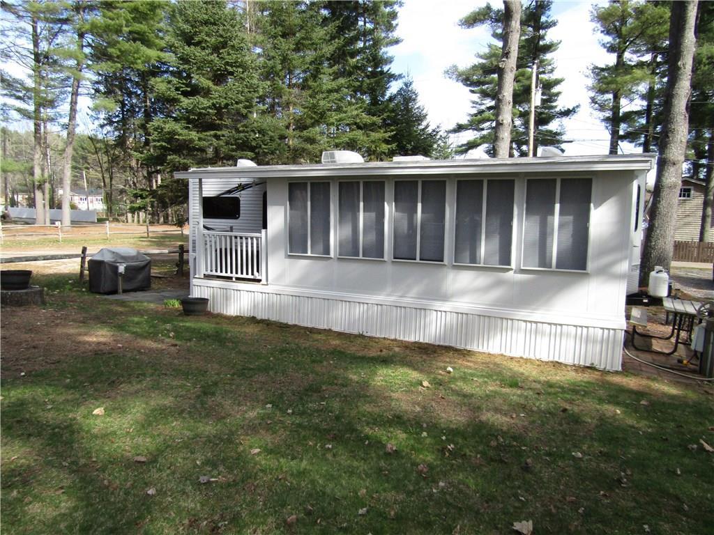 25 Indian Point Road, Unit 51 Raymond, ME 04071 - Photo 3 of 16 Attached Sun Room