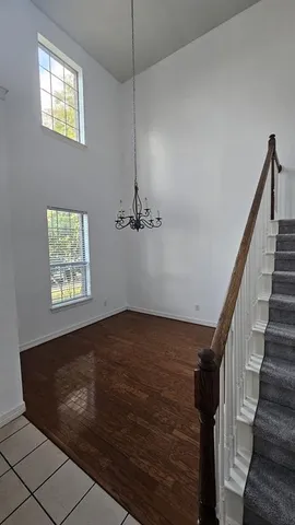 a view of a hallway with a window