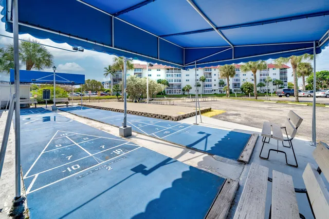 a view of a swimming pool with a porch