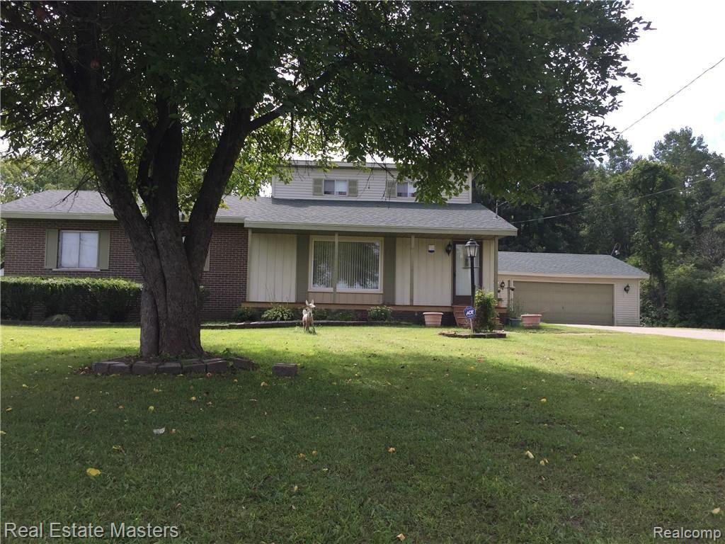 3515 Dove Road Port Huron, MI 48060 - Photo 1 of 10 dove front tree.JPG