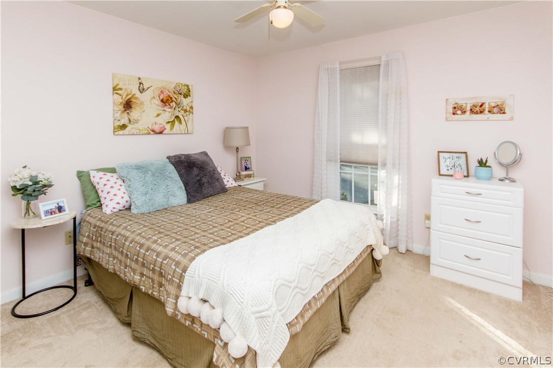 5512 Gatebridge Road North Chesterfield, VA 23234 - Photo 16 of 23 a spacious bedroom with a bed and a cabinets