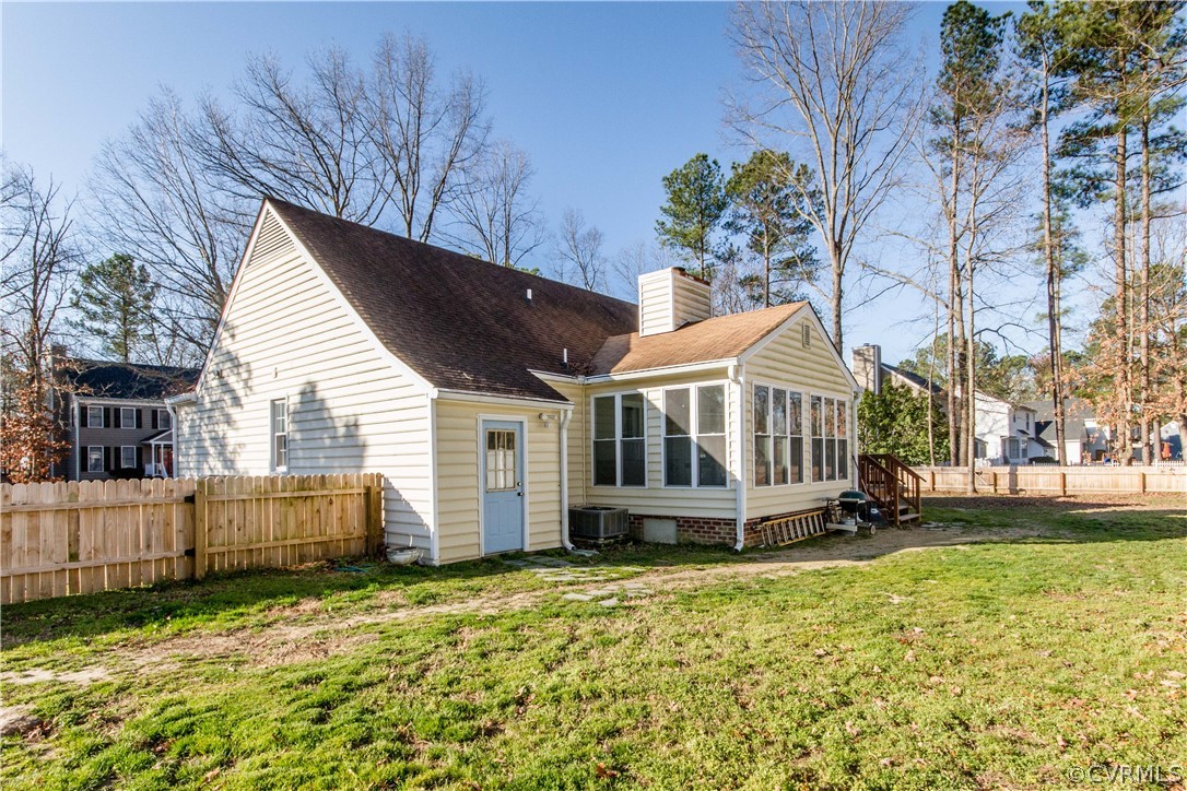5512 Gatebridge Road North Chesterfield, VA 23234 - Photo 19 of 23 a view of a house with a yard and wooden fence
