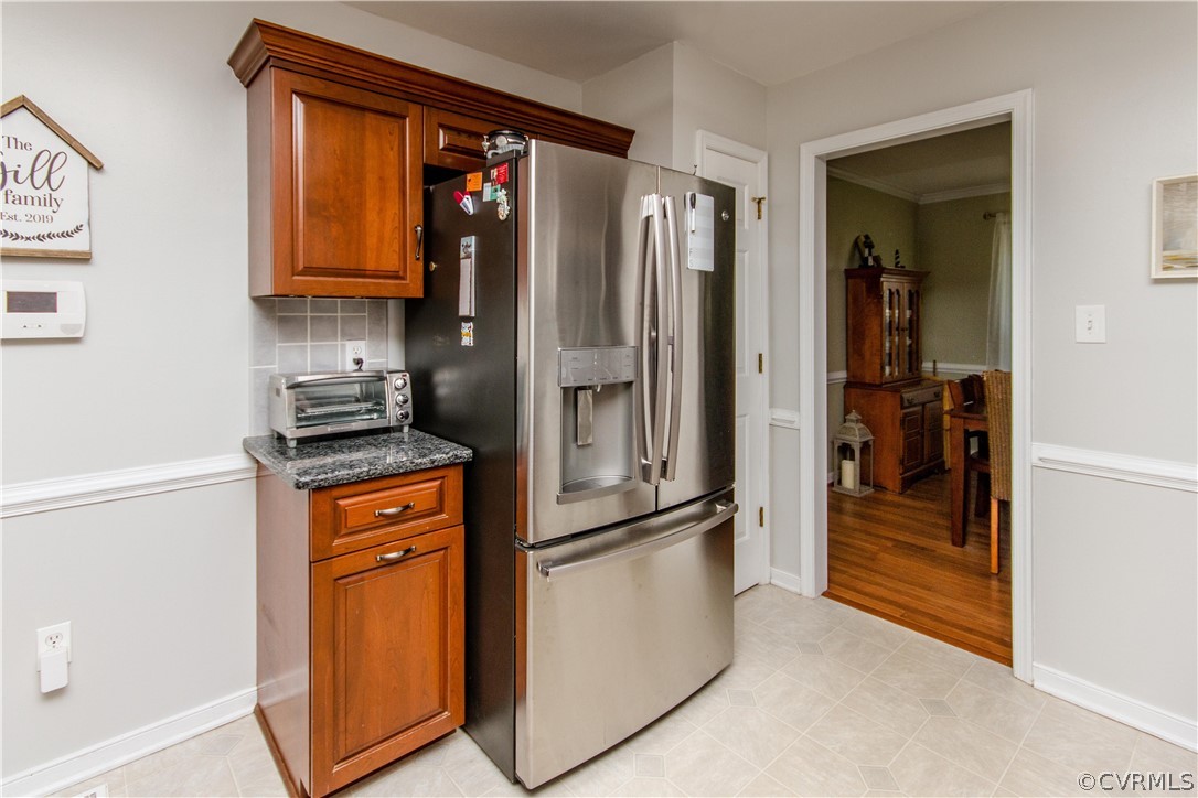 5512 Gatebridge Road North Chesterfield, VA 23234 - Photo 6 of 23 a kitchen with stainless steel appliances granite countertop a refrigerator and a stove top oven