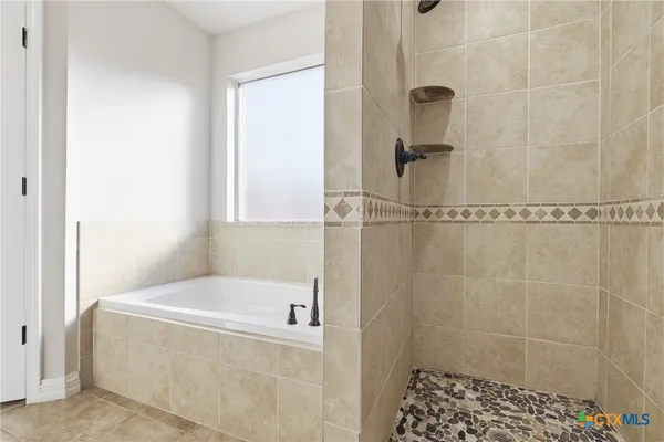 a bathroom with a bathtub