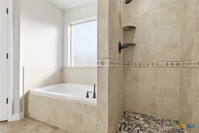 a bathroom with a bathtub