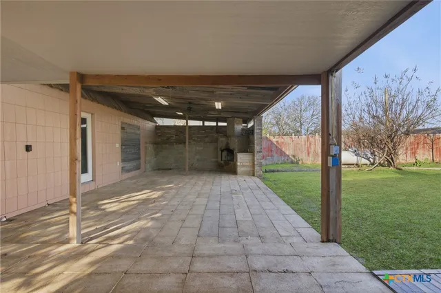 a view of a porch with a backyard