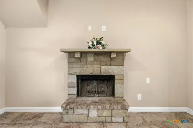 a living room with a fireplace