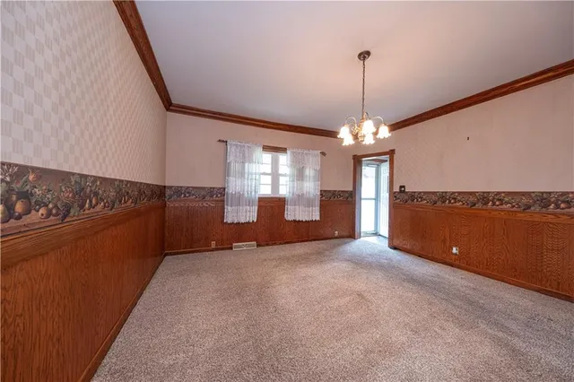 a kitchen with stainless steel appliances granite countertop a stove sink and microwave