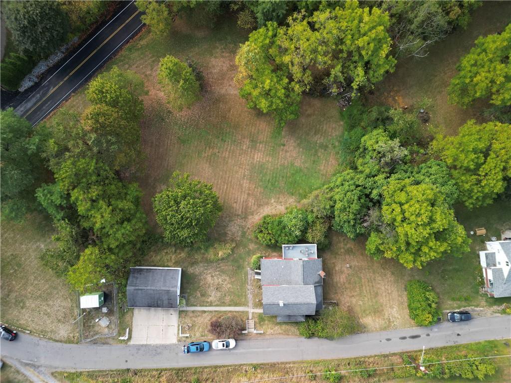 1645 Brown Road Ellwood City, PA 16117 - Photo 32 of 35 an aerial view of a house with a yard and lake view