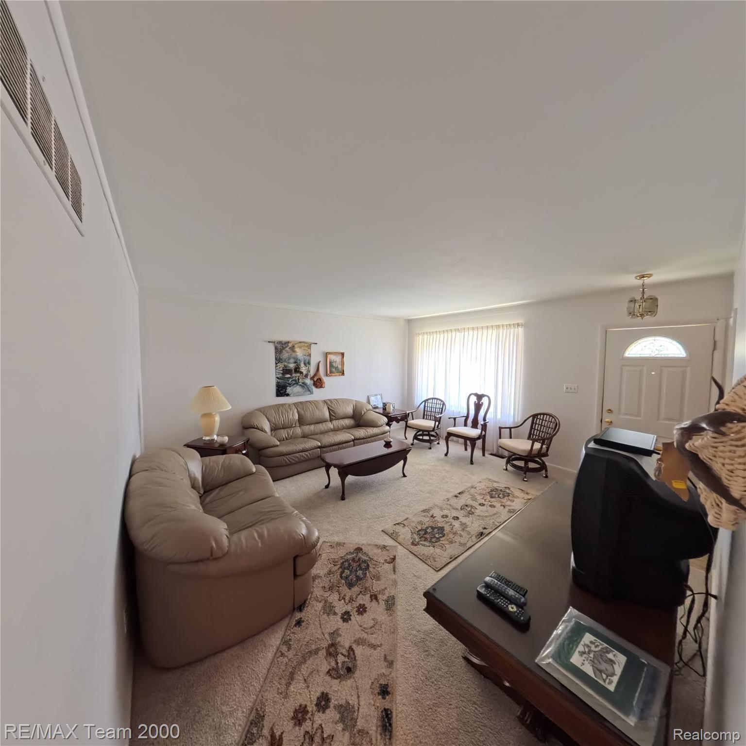 2104 Whittier Road Ypsilanti, MI 48197 - Photo 10 of 45 Living area featuring carpet flooring
