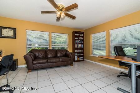1930 Forbes Road St. Augustine, FL 32092 - Photo 12 of 24 a living room with furniture and a window