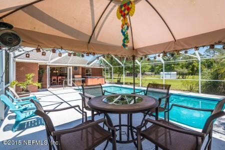 1930 Forbes Road St. Augustine, FL 32092 - Photo 20 of 24 a view of a patio with a table and chairs