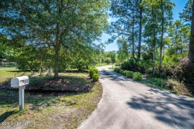 1930 Forbes Road St. Augustine, FL 32092 - Photo 2 of 24 a view of a water fountain with large trees