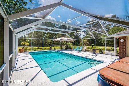1930 Forbes Road St. Augustine, FL 32092 - Photo 22 of 24 a view of a backyard with sitting area