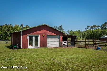 1930 Forbes Road St. Augustine, FL 32092 - Photo 23 of 24 a front view of a house with garden