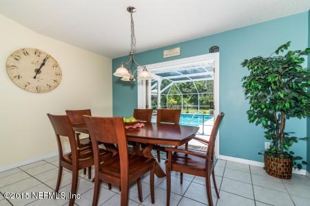 1930 Forbes Road St. Augustine, FL 32092 - Photo 9 of 24 a view of a dining room with furniture window and outside view