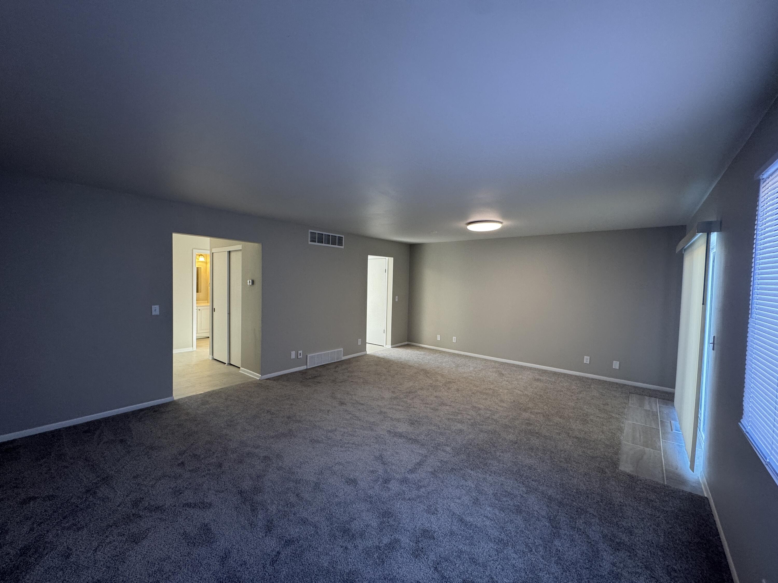 5742 Cambridge Circle, Unit 5 Mount Pleasant, WI 53406 - Photo 5 of 15 5742 Cambridge unit 5 living rm angle 2