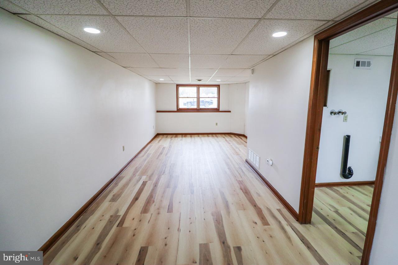614 Eichelberger Street Hanover, PA 17331 - Photo 23 of 36 a view of a room with wooden floor and staircase