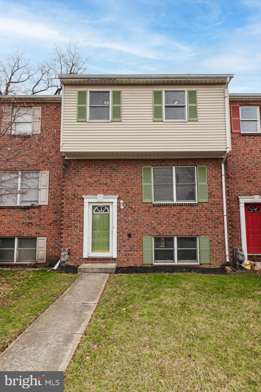 614 Eichelberger Street Hanover, PA 17331 - Photo 3 of 36 front view of a brick house with a yard