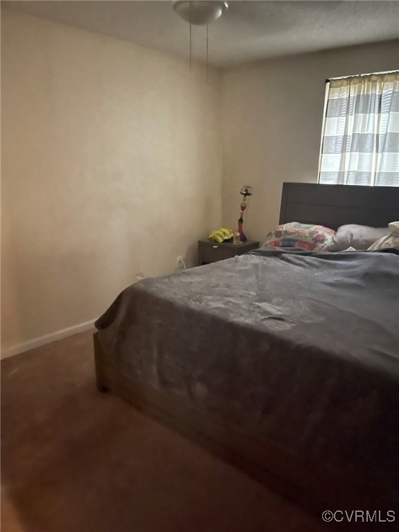 10131 Ridgerun Road Chesterfield, VA 23832 - Photo 11 of 18 a bedroom with a bed and window
