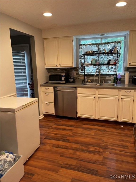 10131 Ridgerun Road Chesterfield, VA 23832 - Photo 8 of 18 a kitchen with stainless steel appliances wooden floor and a sink
