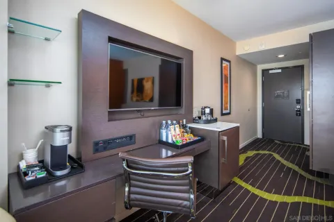 a bathroom with a shower and sink