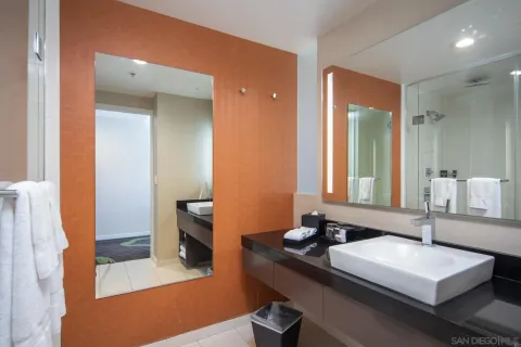 a bathroom with a sink and a mirror