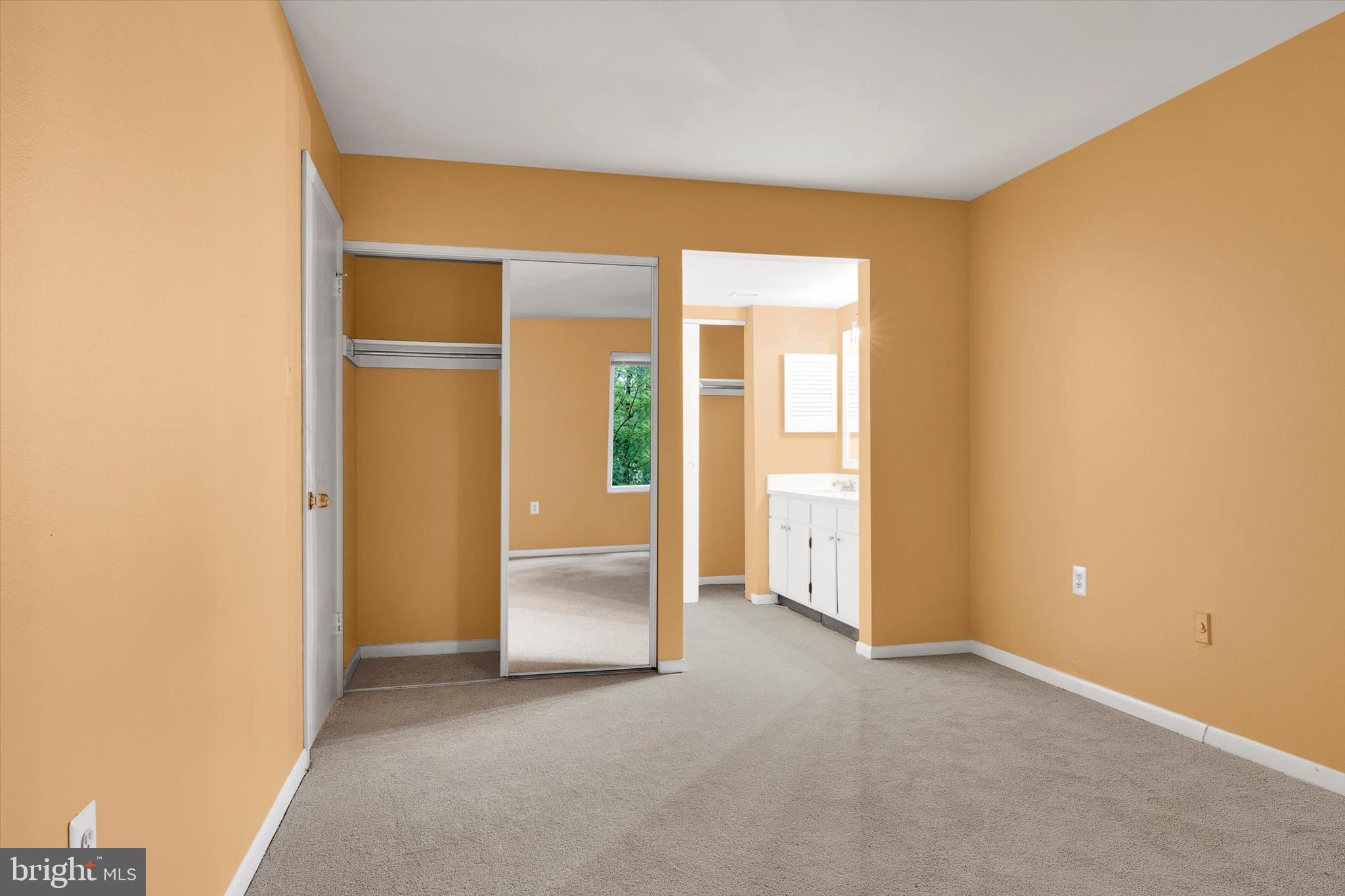 10310 Rein Commons Court, Unit 1B Burke, VA 22015 - Photo 16 of 23 an empty room with closet and a hallway
