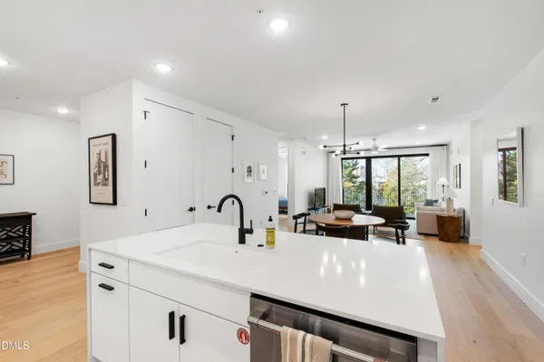 a view of a center island and living room