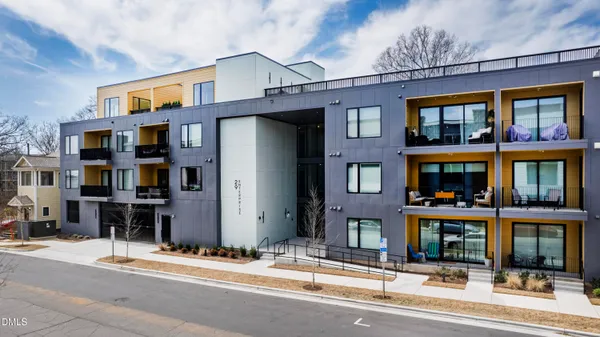a front view of a building with street view