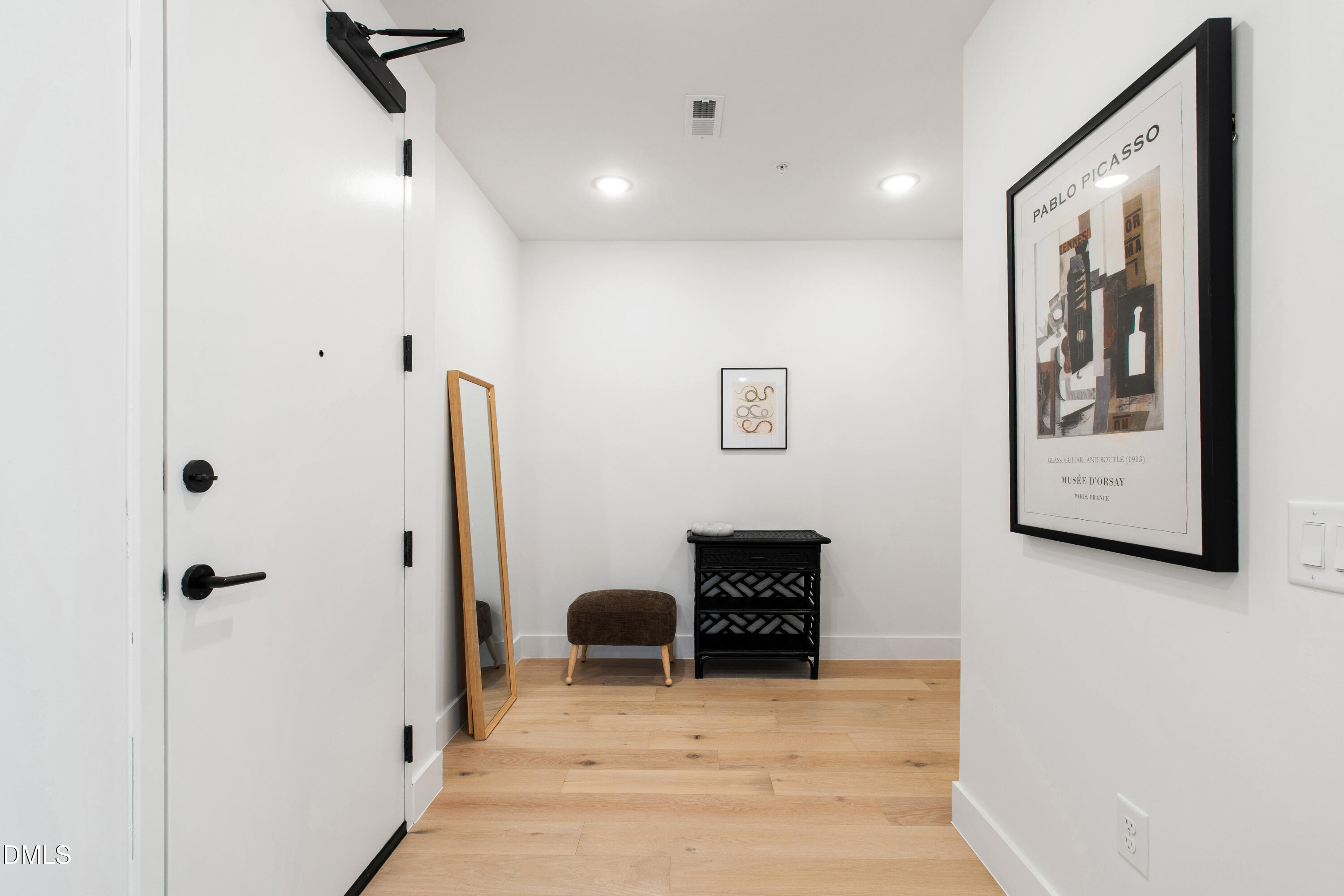 29 Enterprise Street, Unit 211 Raleigh, NC 27607 - Photo 4 of 48 a view of livingroom with furniture and staircase
