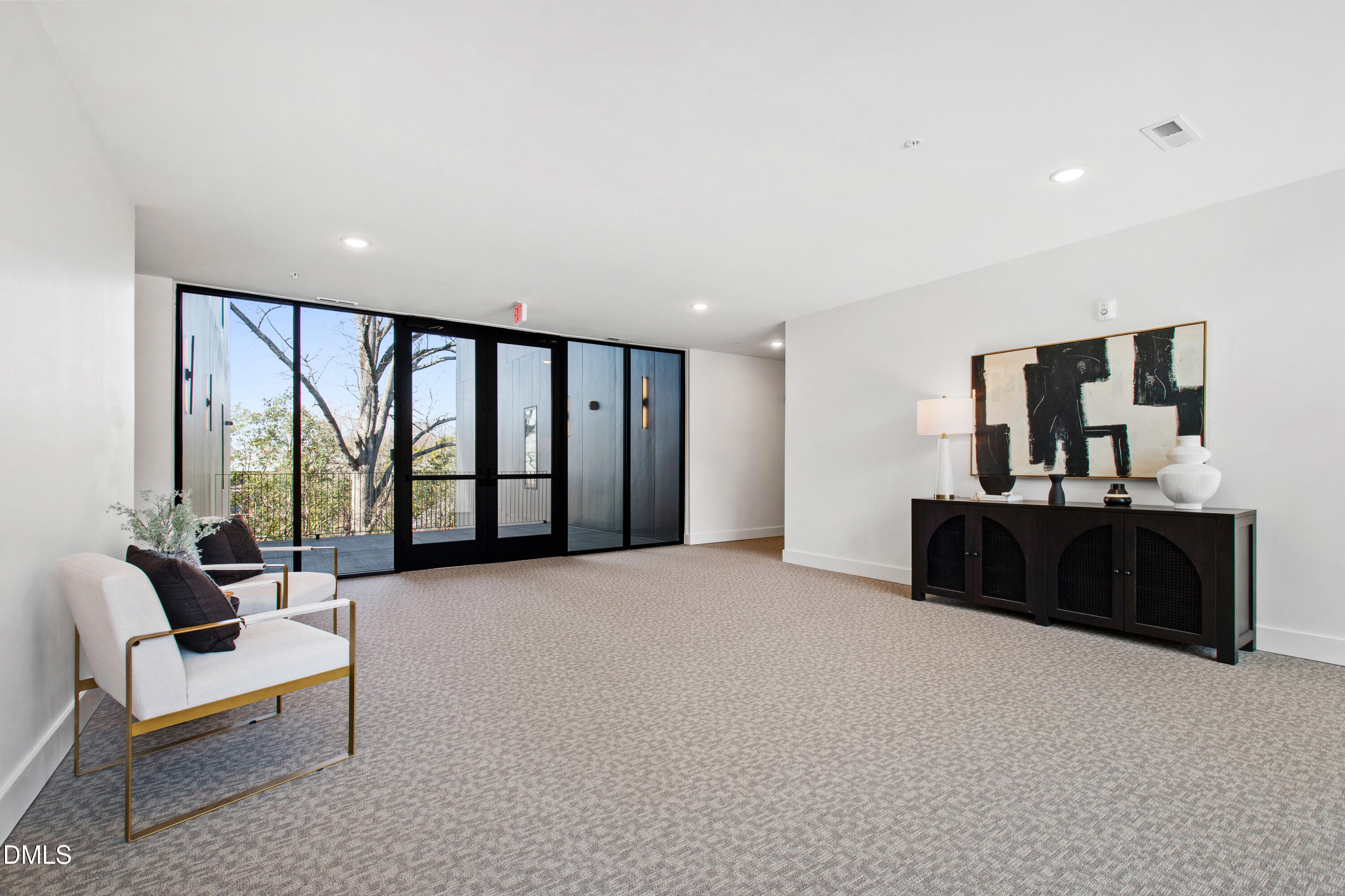29 Enterprise Street, Unit 211 Raleigh, NC 27607 - Photo 43 of 48 a living room with furniture and a large window