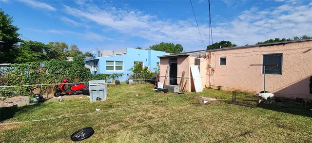 a front view of a house with yard