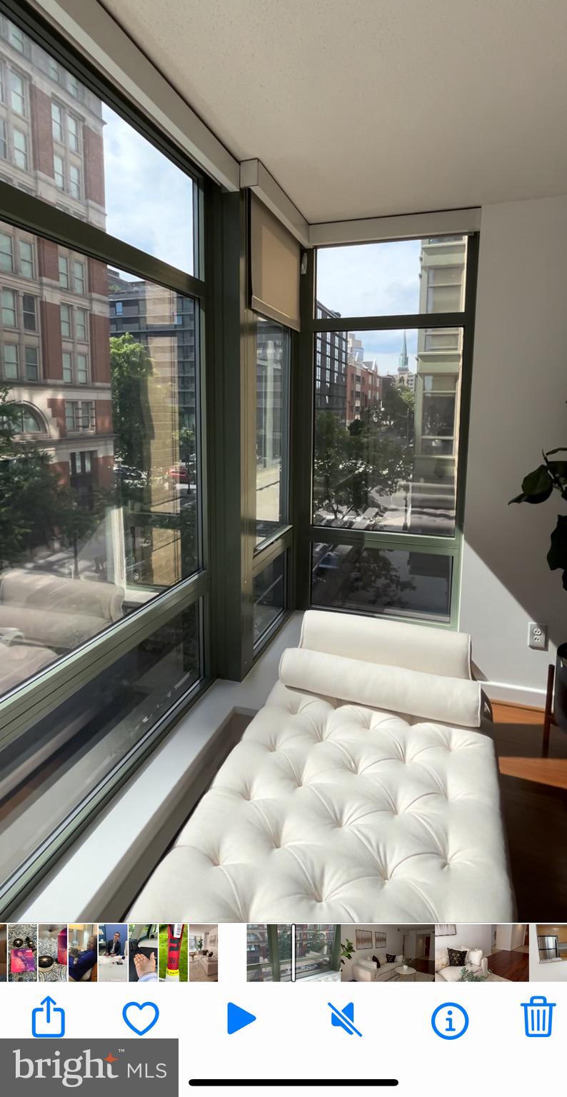 1150 K Street Northwest, Unit 408 Washington, DC 20005 - Photo 10 of 32 a picture of a living room with a large window
