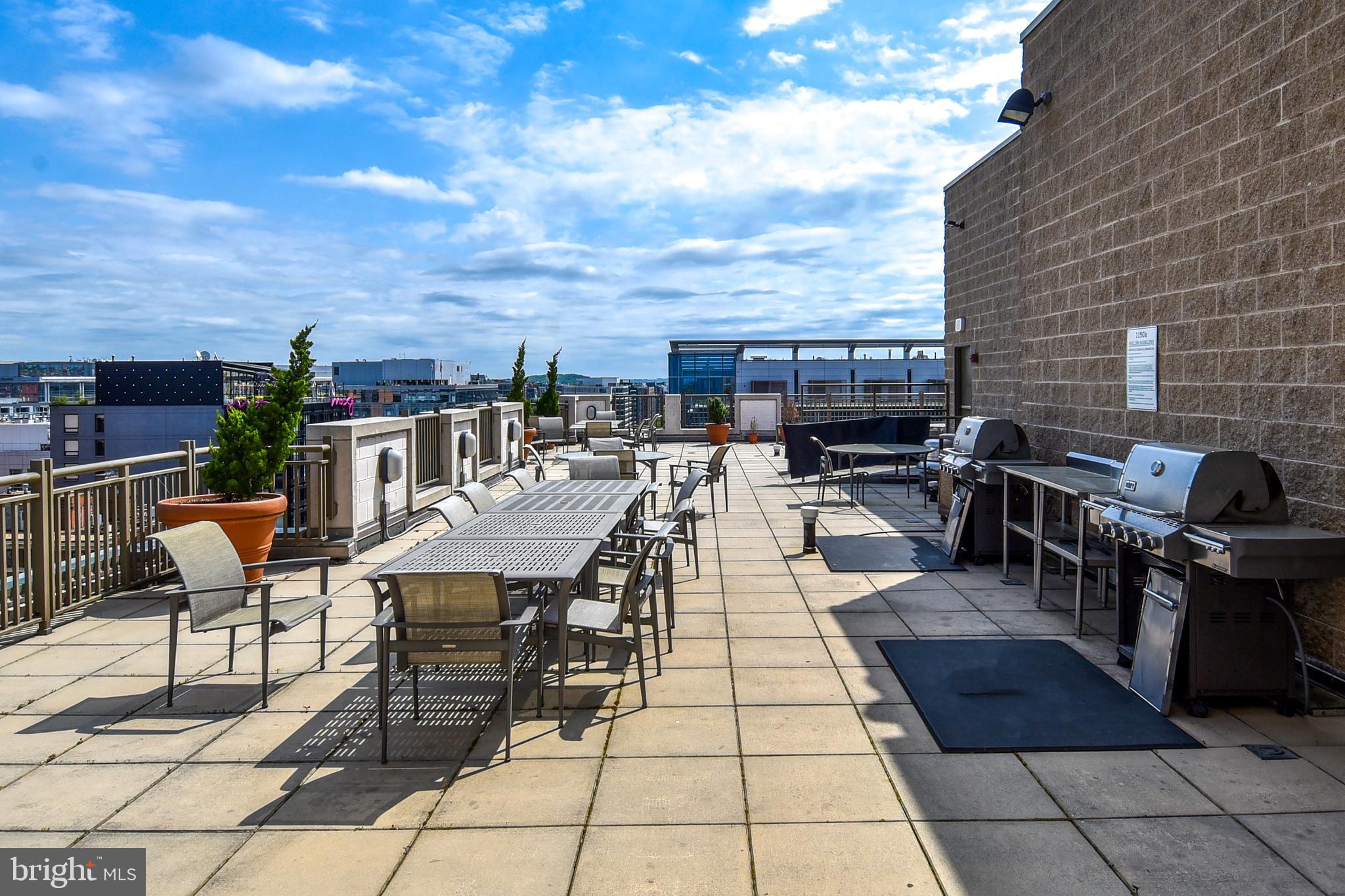 1150 K Street Northwest, Unit 408 Washington, DC 20005 - Photo 28 of 32 a view of a terrace with seating area