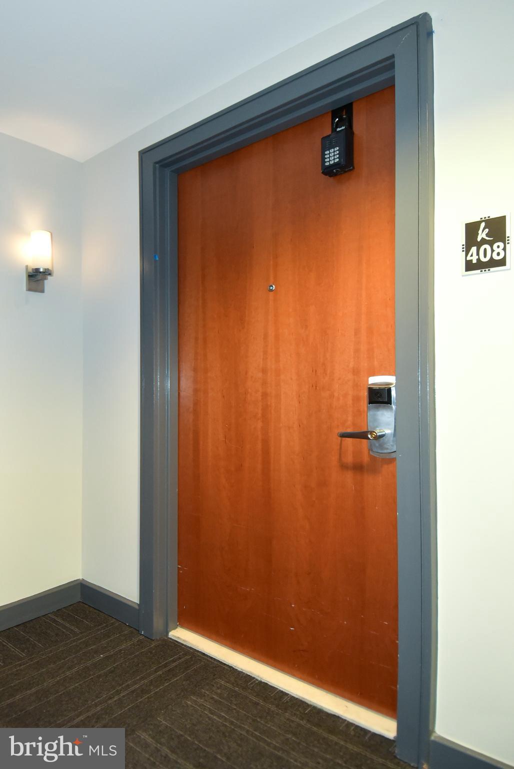 1150 K Street Northwest, Unit 408 Washington, DC 20005 - Photo 5 of 32 a view of a small space with wooden floor
