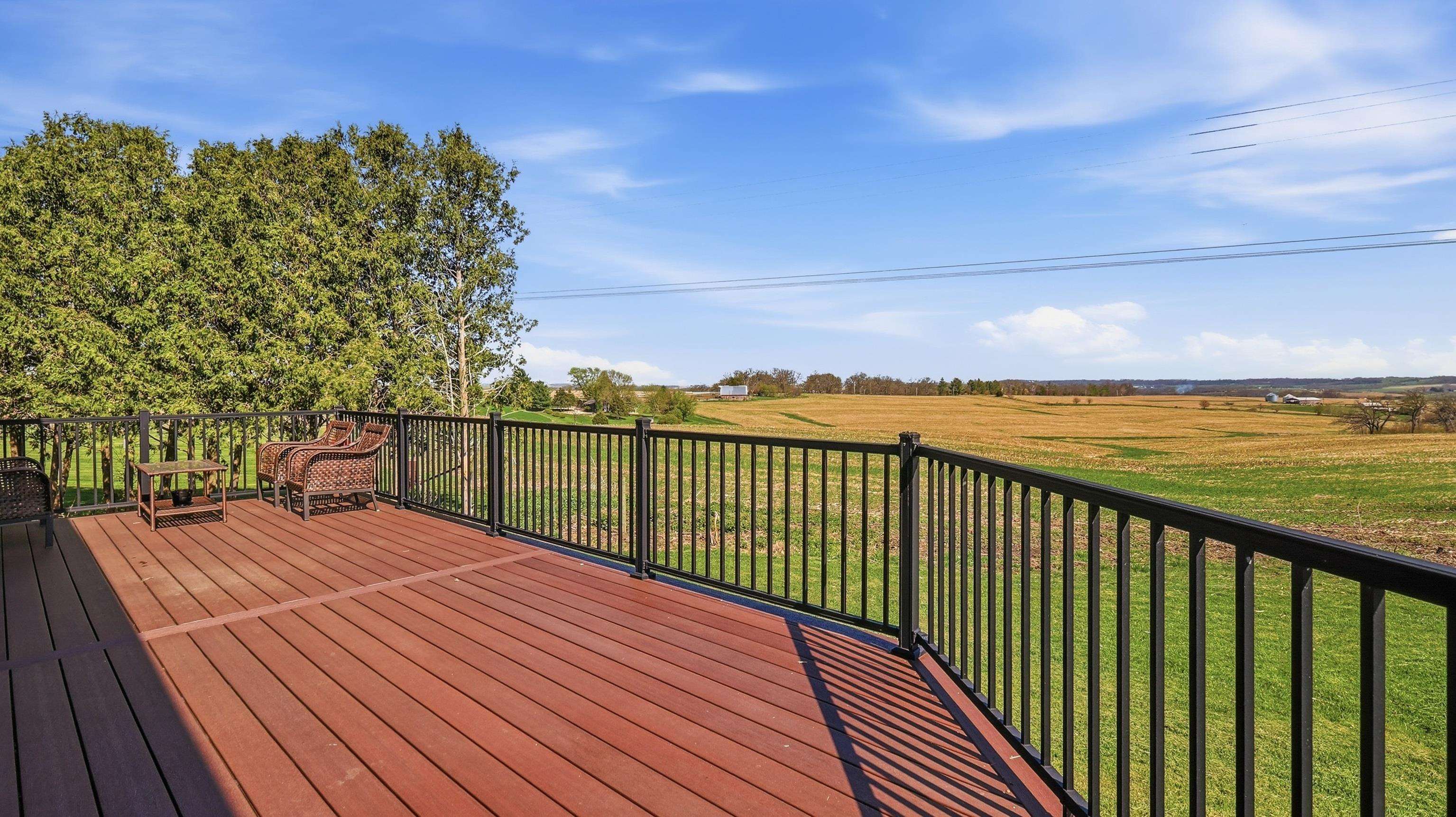 6603 West Council Hill Road Scales Mound, IL 61075 - Photo 17 of 49 a balcony with an ocean view
