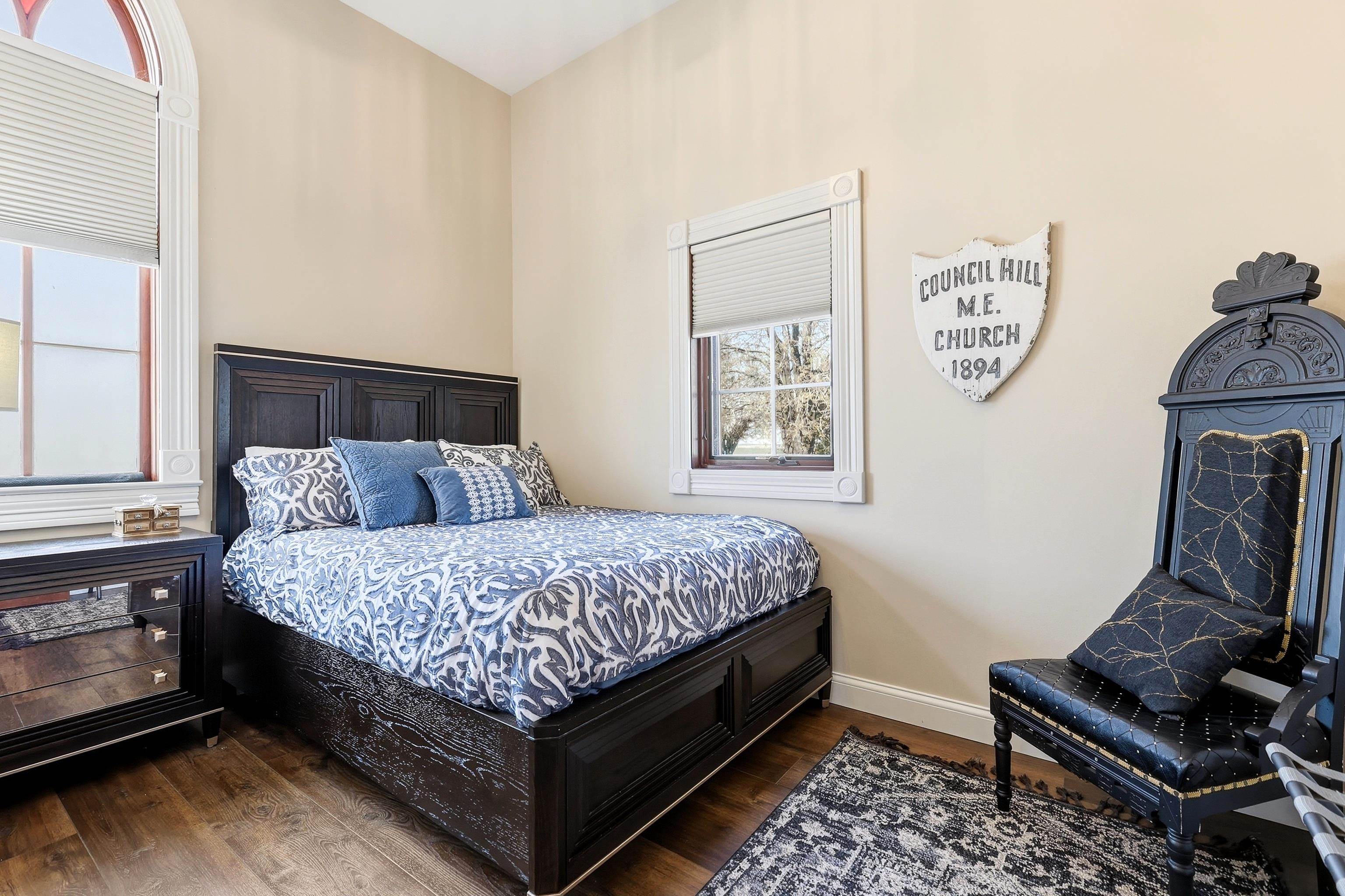 6603 West Council Hill Road Scales Mound, IL 61075 - Photo 21 of 49 a bed room with a bed and a chair