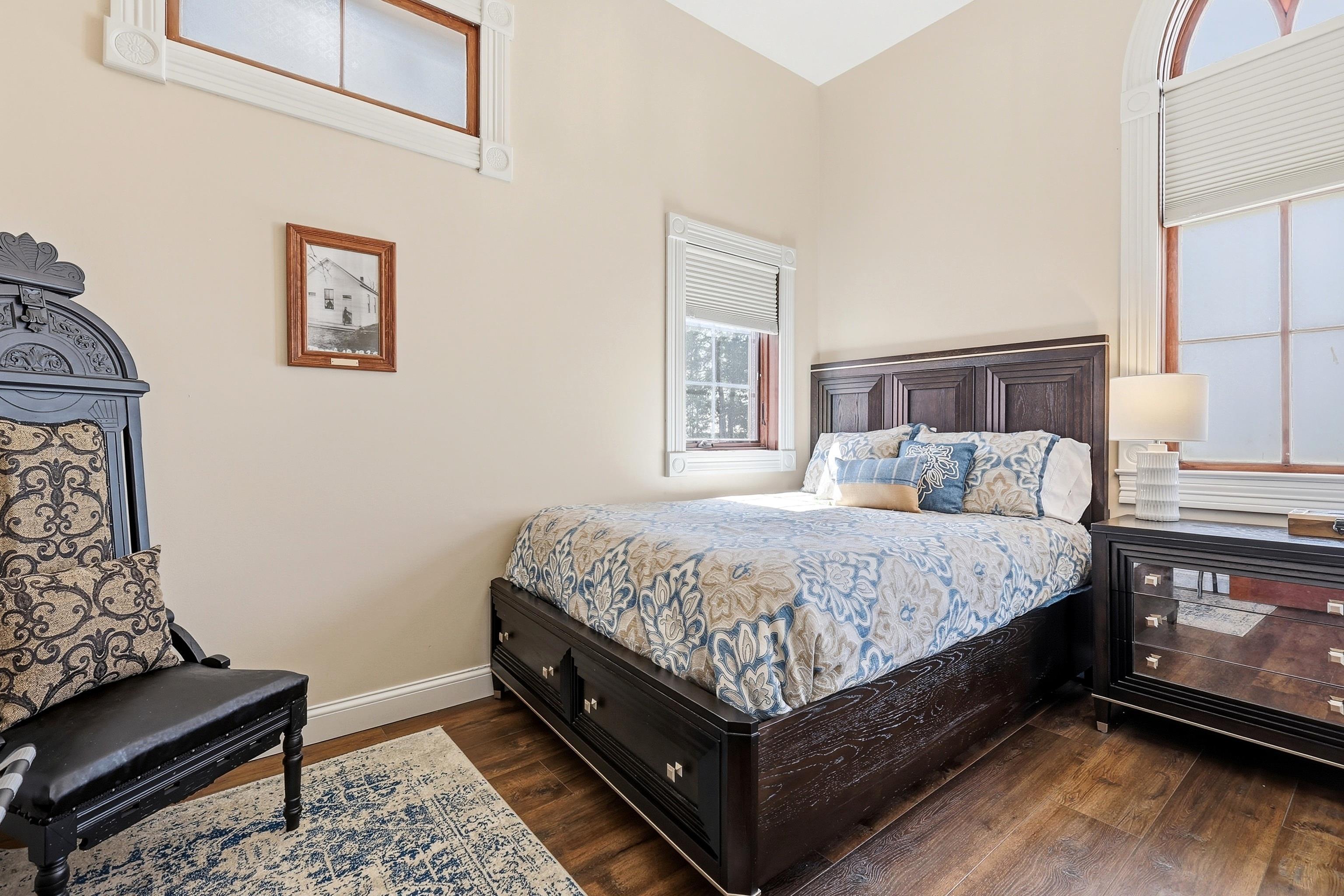 6603 West Council Hill Road Scales Mound, IL 61075 - Photo 23 of 49 a bed room with a bed and a couch