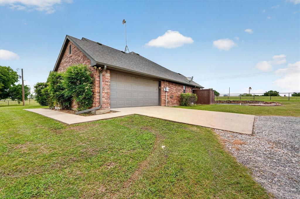 2828 Bennett Road Howe, TX 75459 - Photo 4 of 39 a view of a house with a yard