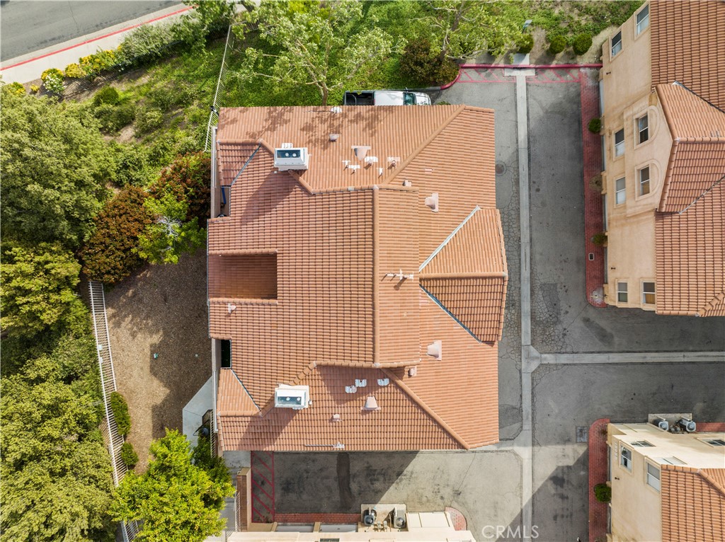 19847 Sandpiper Place, Unit 139 Newhall, CA 91321 - Photo 10 of 50 an aerial view of a house with a garden