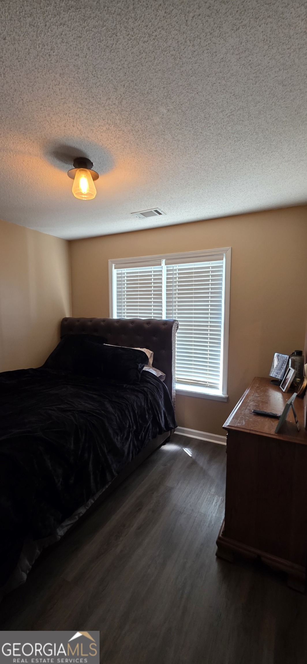 140 Villa Rosa Road Temple, GA 30179 - Photo 17 of 22 a bedroom with a bed and a window