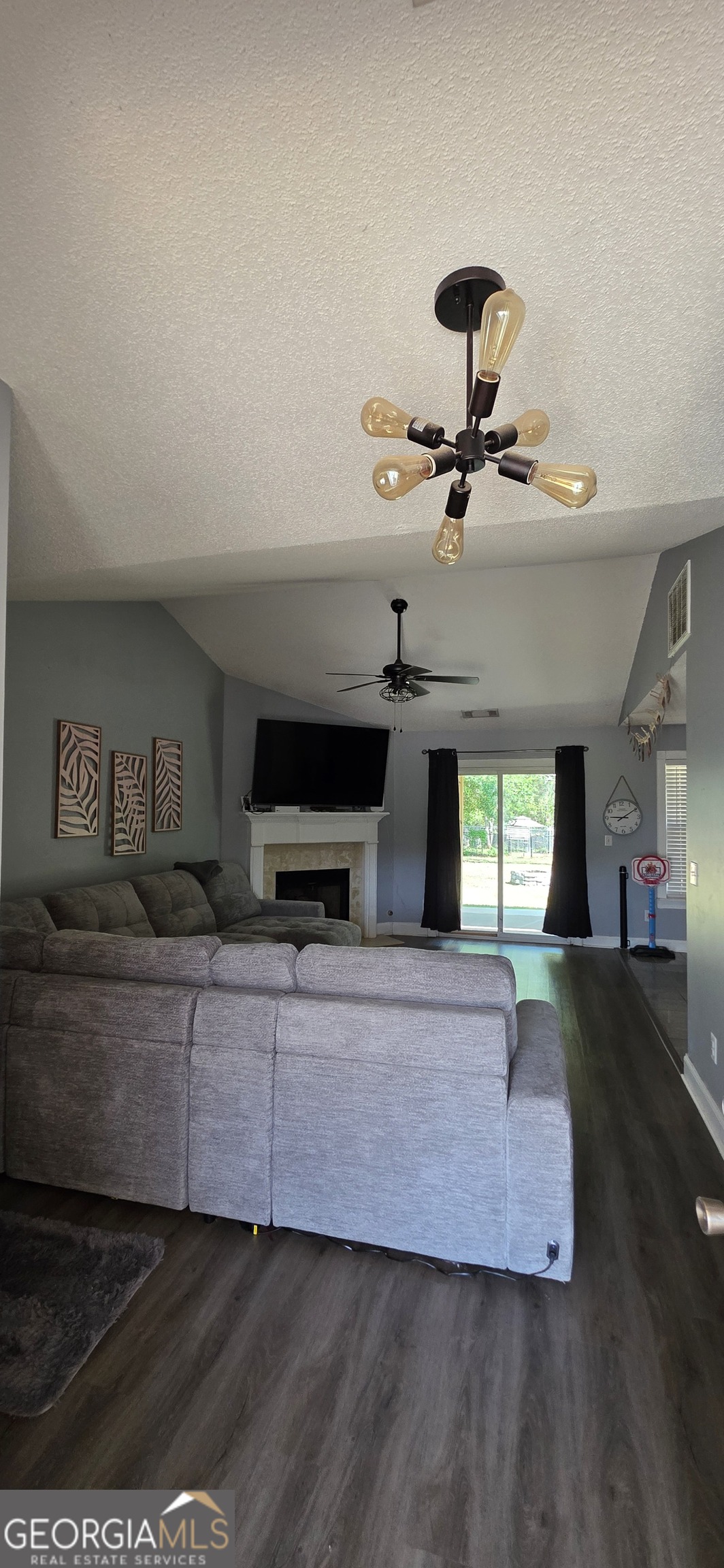 140 Villa Rosa Road Temple, GA 30179 - Photo 3 of 22 a living room with furniture and a flat screen tv