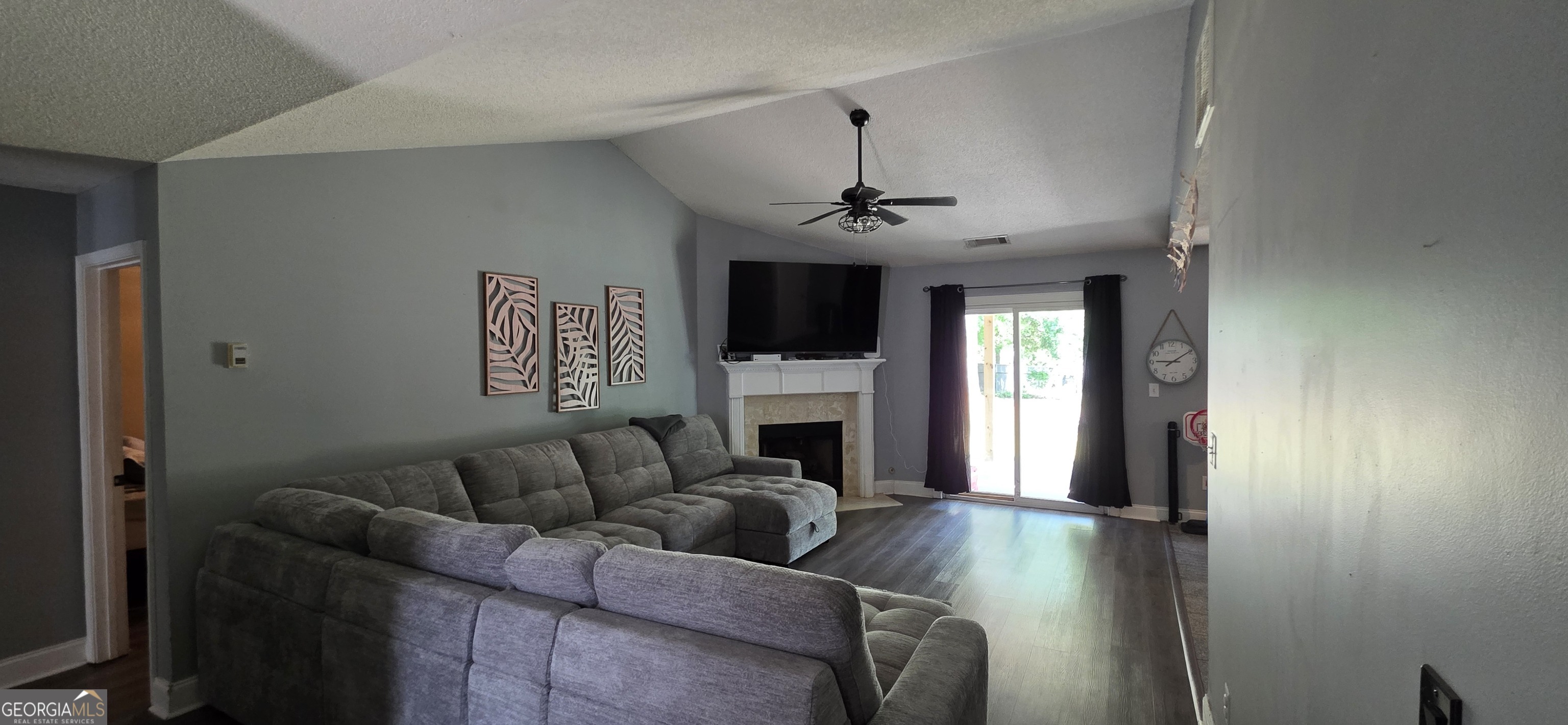 140 Villa Rosa Road Temple, GA 30179 - Photo 4 of 22 a living room with furniture and a flat screen tv
