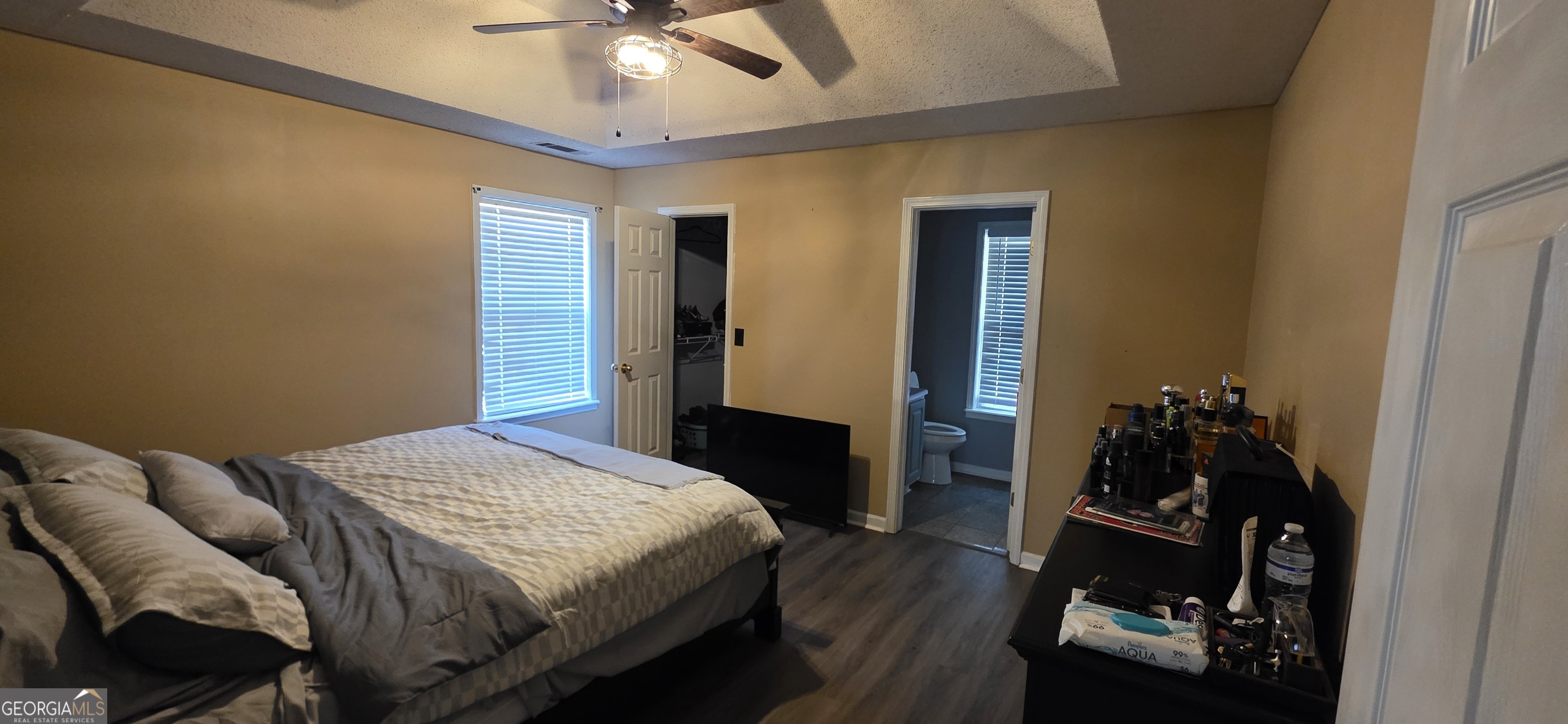 140 Villa Rosa Road Temple, GA 30179 - Photo 9 of 22 a bedroom with a bed and wooden floor
