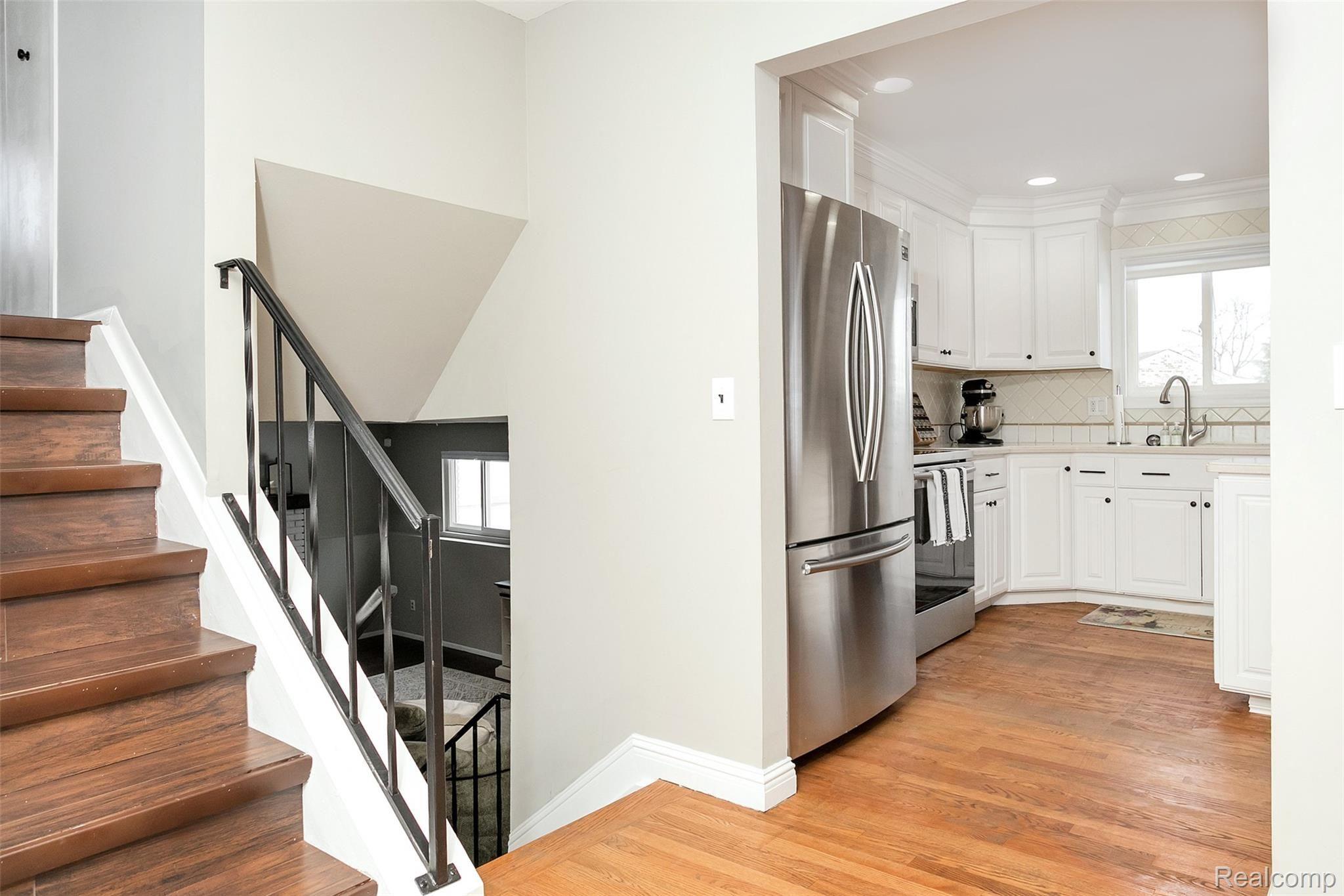 3684 Jennifer Drive Sterling Heights, MI 48310 - Photo 16 of 39 Kitchen and staircase