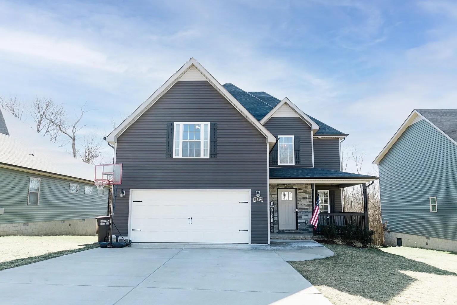 a front view of a house with parking