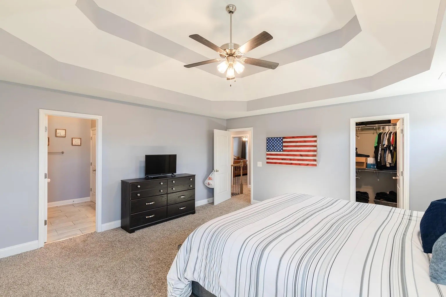 1839 Rains Road Clarksville, TN 37042 - Photo 11 of 22 a bedroom with a bed and a chandelier