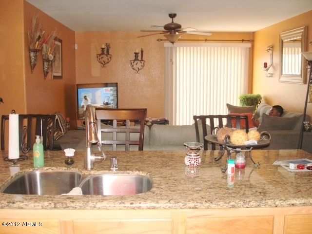 7132 West Zak Road Phoenix, AZ 85043 - Photo 9 of 14 Kitchen Opens to Spacious Family Room