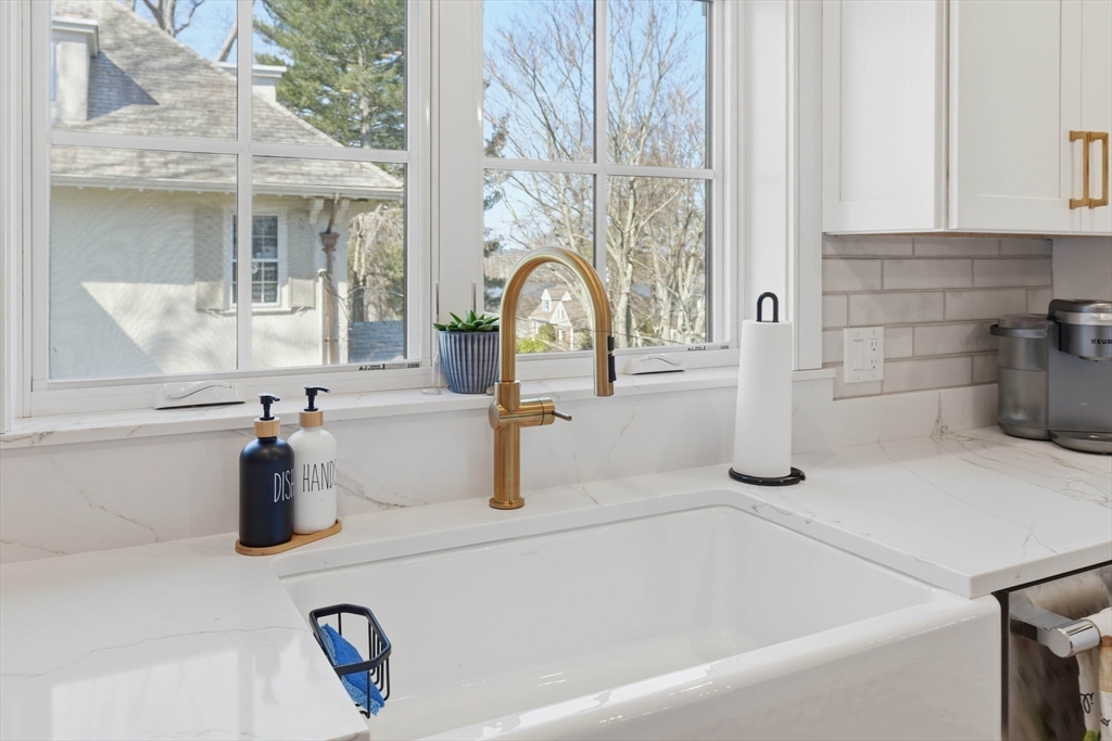 20 Lawrence Street, Unit 2 Wakefield, MA 01880 - Photo 14 of 38 a bathroom with a sink and a window
